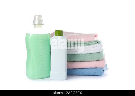 Laundry detergent and folded towels isolated on white background Stock Photo