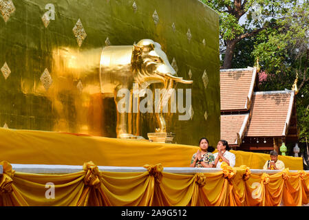 Faithful people at  Wat Phra Singh, Buddhist temple, Chiang Mai , Thailand Stock Photo