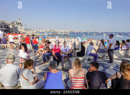 People Sat In The Shade On The Promenade In Cascais Portugal Near The Food Truck Vendors By The Beach Cascais Lisbon Portugal Stock Photo