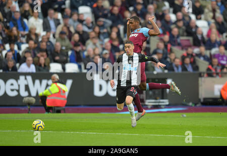 Issa Diop of West Ham Utd brings down Miguel Almiron of Newcastle Utd for a free kick that lead to the first Newcastle goal during the West Ham vs New Stock Photo