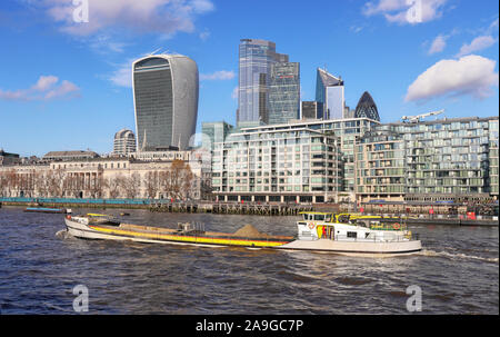 London Cityscape from the river Thames with the Walkie Talkie building against a blue sky Stock Photo