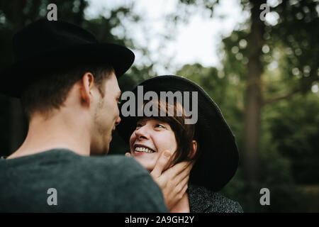 young heterosexual couple looking at each other Stock Photo