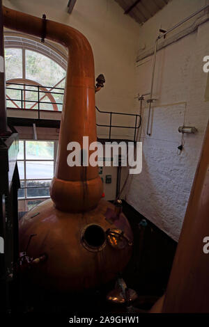 Copper Still and tubes, Tobermory Whisky Distillery,Isle of Mull, West of Scotland, UK, PA75 6AB Stock Photo