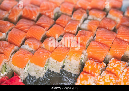 Big sushi set made of fresh vegetables and seafood Stock Photo by
