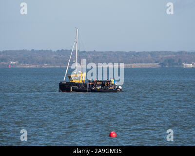 Sinking of a sunk foundered Beneteau First 40 off Cowes Gurnard bay Solent salvage rudder loss break Stock Photo