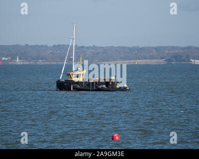 Sinking of a sunk foundered Beneteau First 40 off Cowes Gurnard bay Solent salvage rudder loss break Stock Photo