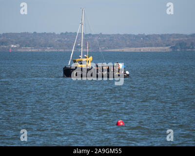 Sinking of a sunk foundered Beneteau First 40 off Cowes Gurnard bay Solent salvage rudder loss break Stock Photo