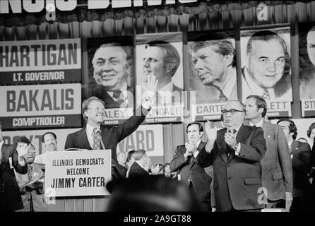 Jimmy Carter and Mayor Richard J. Daley ride in a torchlight parade ...