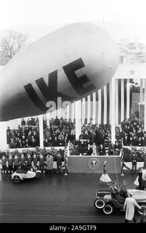 U.S. President Dwight Eisenhower and U.S. Vice President Richard Nixon Reviewing Inauguration Parade, First Lady Mamie Eisenhower and Second Lady Pat Nixon seated behind, Washington, D.C., USA, photographer Thomas J. O'Halloran, Warren K. Leffler, January 21, 1957 Stock Photo