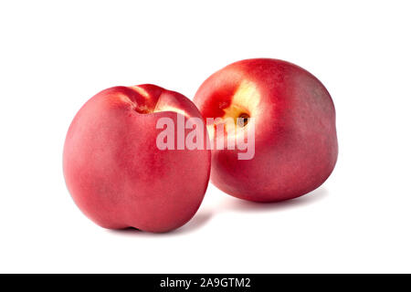 Two ripe nectarines on white background Stock Photo