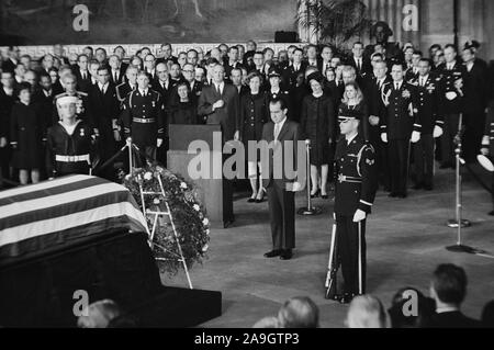 U.S. President Richard M. Nixon Standing before Flag-Draped Casket of Former U.S. President Dwight D. Eisenhower, Washington, D.C., USA, photograph  by Thomas J. O'Halloran, March 30, 1969 Stock Photo