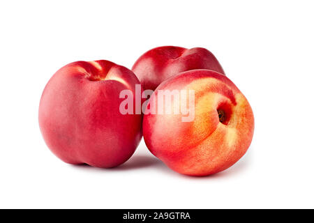 Three ripe nectarines on white background Stock Photo