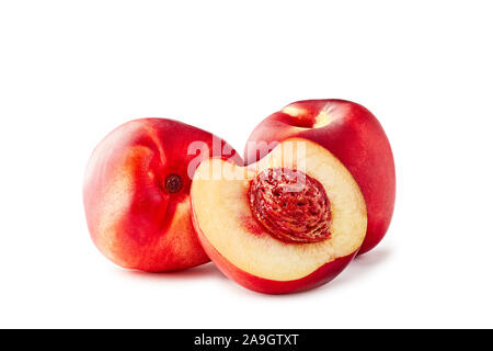 Two and slice of half nectarines on white background Stock Photo