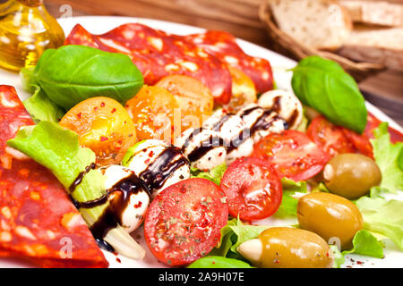 Mozzarella salad and salami Stock Photo