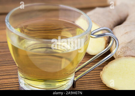 Ginger tea and fresh ginger roots Stock Photo