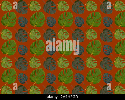 Seamless pattern from real monstera leaves on a dark orange background. Background from tropical leaves. Stock Photo