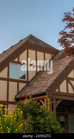 Double Timber Roof Unusual timber frame house with double apex roof Stock Photo - Alamy