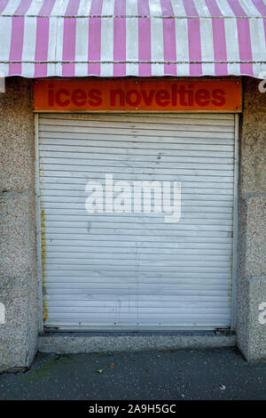 Shuttered ice cream and novelties shop in the seaside town of Girvan, South Ayrshire, Scotland Stock Photo