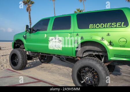 Large monster truck style vehicle in green color, with text reading Biodiesel, advertising the benefits of plant derived biodiesel fuel, Venice, Los Angeles, California, November 5, 2019. () Stock Photo