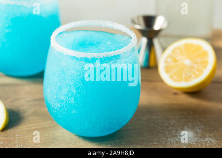 Homemade Frozen Blue Jack Frost Cocktail with Lemon and Vodka Stock Photo