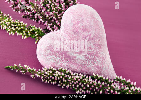 Autum heather flowers and heart Stock Photo