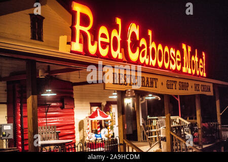 RONKS, Pennsylvania - The Red Caboose Motel, near Lancastter, PA, is a railway themed motel and restaurant. It is not far from other rail-themed attractions and museums nearby. The accommodations for the hotel are in converted old railcars. Stock Photo