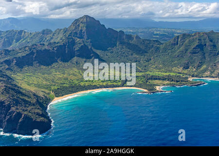 Aerial view of Kauai south coast showing mountains, beach and rugged coastline near Poipu Kauai Hawaii USA Stock Photo