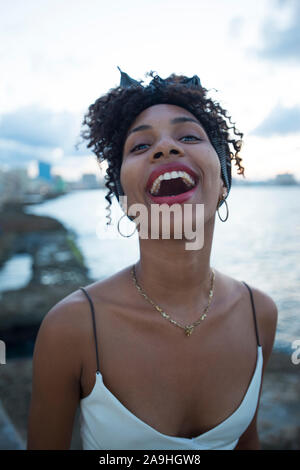 Portrait of happy young Latin woman Stock Photo
