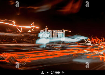Abstract speed motion in highway road car light trails colorful night lights perspective Stock Photo