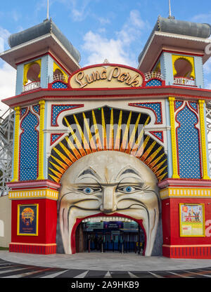 Iconic Mr Moon Face entrance to Luna Park amusement park fairground in St Kilda Melbourne Victoria Australia.