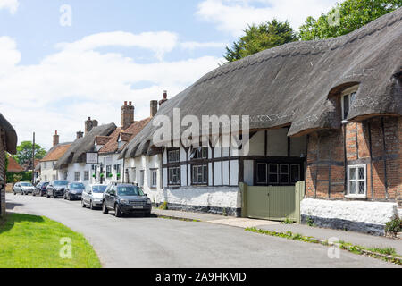 Thatched cottages, High Street, Long Crendon, Buckinghamshire, England, United Kingdom Stock Photo