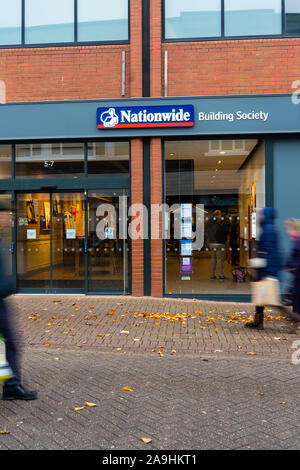 People, shoppers walk past the Nationwide building society and bank on the high street and city centre, Hanley, Stoke on Trent, Staffordshire Stock Photo