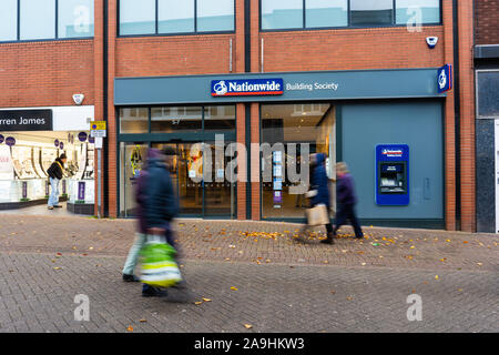 People, shoppers walk past the Nationwide building society and bank on the high street and city centre, Hanley, Stoke on Trent, Staffordshire Stock Photo