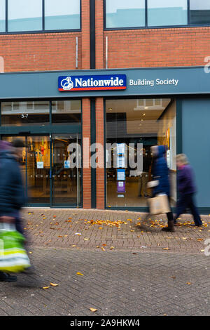 People, shoppers walk past the Nationwide building society and bank on the high street and city centre, Hanley, Stoke on Trent, Staffordshire Stock Photo