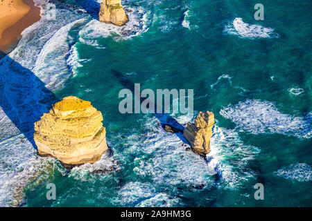 Rock stacks within the Southern Ocean remaining from the Twelve Apostles along the Great Ocean Road in Victoria, Australia Stock Photo