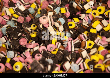 pink and black and white colored liquorice candies Stock Photo