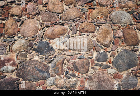 Ancient wall made of stones. Stock Photo
