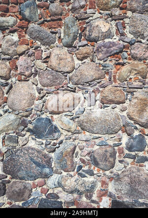 Ancient wall made of stones. Stock Photo