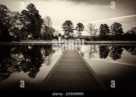 Moody black and white image of Straus Lake reflections in Brevard, North Carolina, USA Stock Photo
