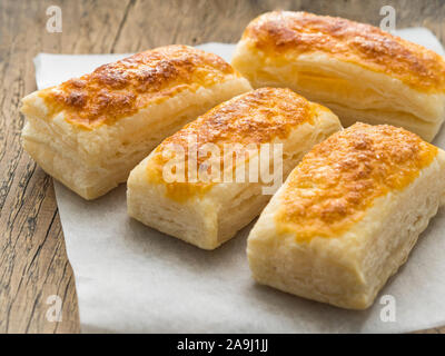 few fresh rolls with a delicious crust of puff pastry, close-up, selective focus, Stock Photo