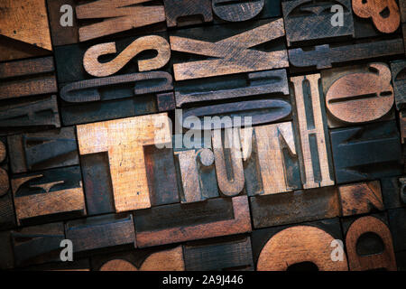 truth word made from wooden letterpress blocks inside many letters background Stock Photo