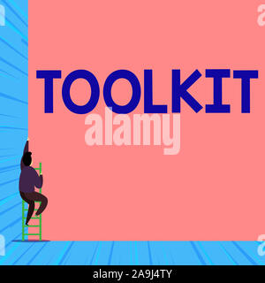Text sign showing Toolkit. Business photo showcasing set of tools kept in a bag or box and used for a particular purpose Back view young man climbing Stock Photo