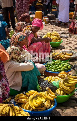 Ethiopia, East Hararghe, Harar, Harar Jugol, Shewa Gate, Old Christian Market, women selling fruit Stock Photo