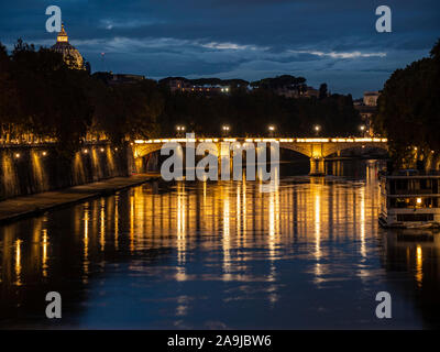 night on bridge Giuseppe Mazzini and the Fiume Tevere river in Rome Italy Stock Photo