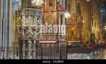 VIENNA, AUSTRIA-OCTOBER, 9, 2017: the intricately carved stone pulpit in st stephen's cathedral in vienna Stock Photo