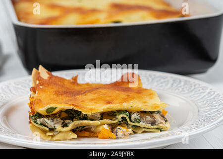 Lasagna Tray Bake With Butternut Squash, Spinach, Ricotta Cheese And Mozzarella Stock Photo
