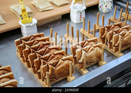 Korean style pancake (Bungeoppang), fish-shaped bread with sweet red bean filling, street food in Seoul, South Korea Stock Photo