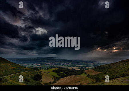 Rainstorm as dusk over the Vale of Clywd, North Wales Stock Photo