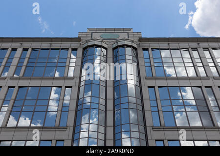 Facade modern office building with glass windows in Budapest, Hungary Stock Photo