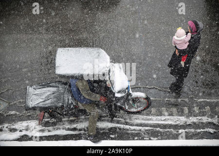 Tehran, IRAN. 16th Nov, 2019. Iranians walk amid the snow in the capital Tehran. Heavy snowfall blanketed the streets of north Tehran on Saturday, causing traffic chaos and forcing the closure of schools, authorities in the Iranian capital said. Credit: Rouzbeh Fouladi/ZUMA Wire/Alamy Live News Credit: ZUMA Press, Inc./Alamy Live News Stock Photo